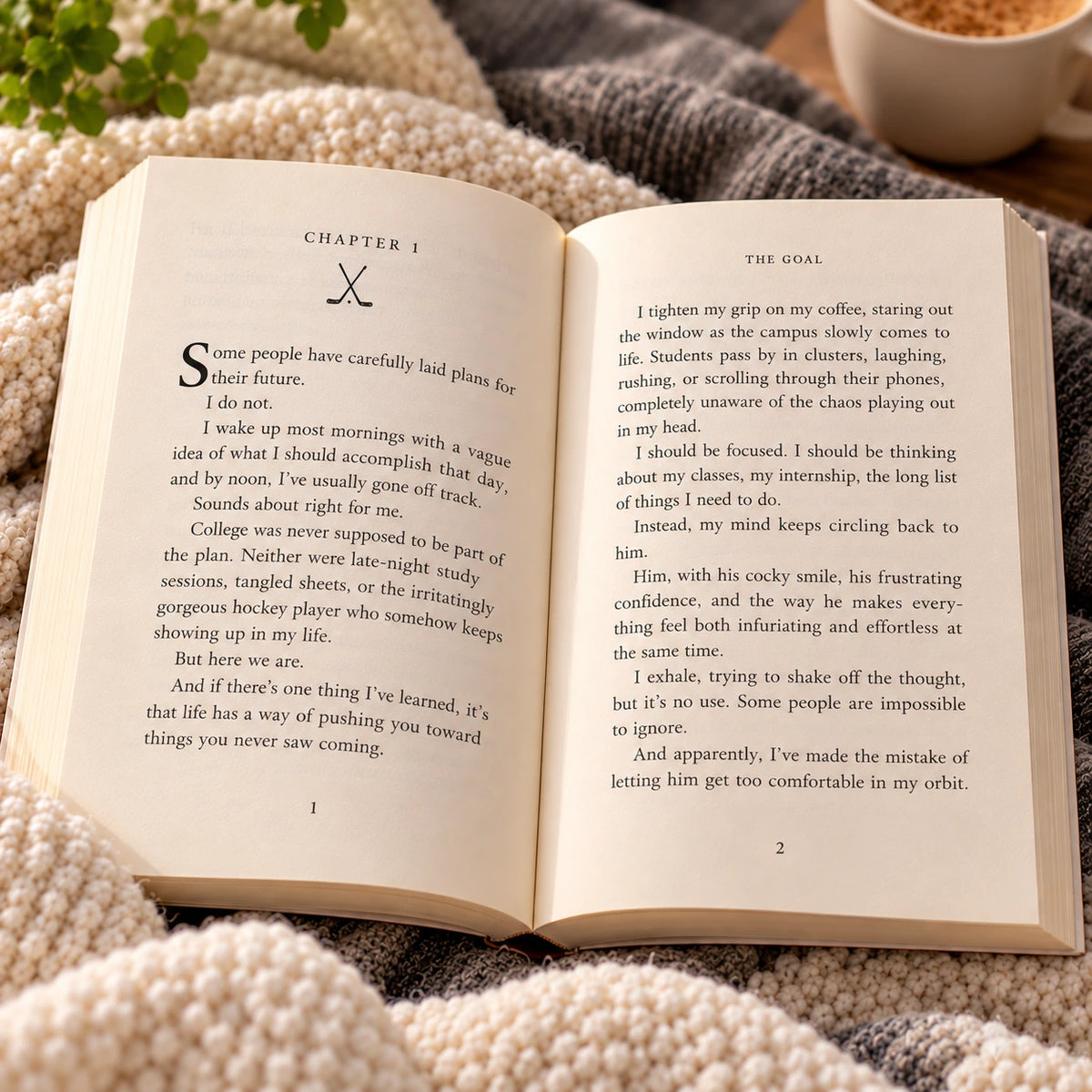 The Goal by Elle Kennedy open to an interior chapter page in a cozy reading setting