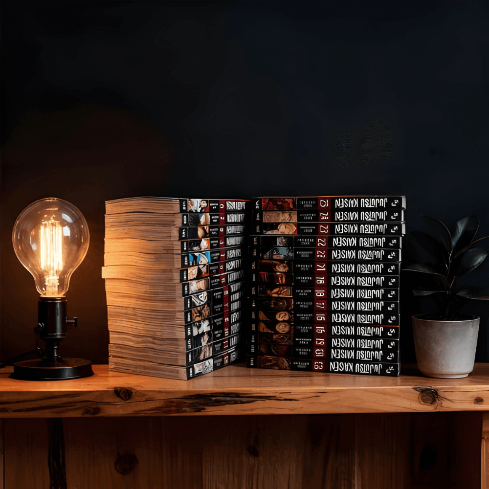 A stack of Jujutsu Kaisen manga volumes sits on a wooden shelf next to a lit vintage light bulb and a small potted plant against a black background.