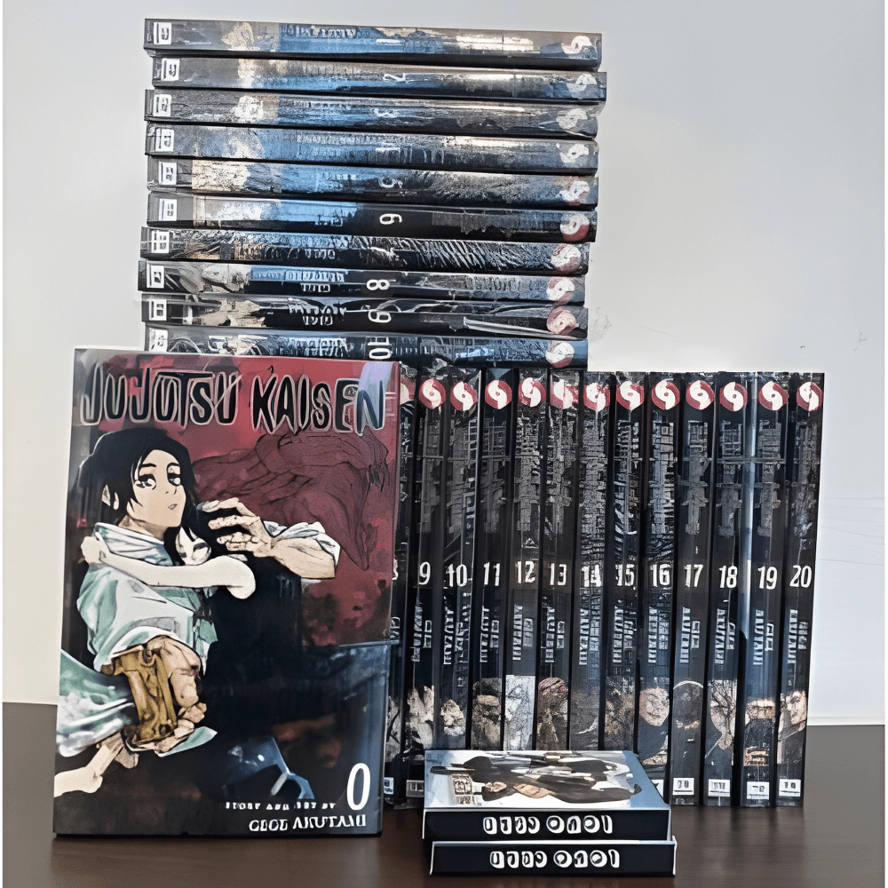 A large collection of Jujutsu Kaisen manga volumes arranged in a stack and in a row on a wooden surface with the volume 0 cover displayed in front.